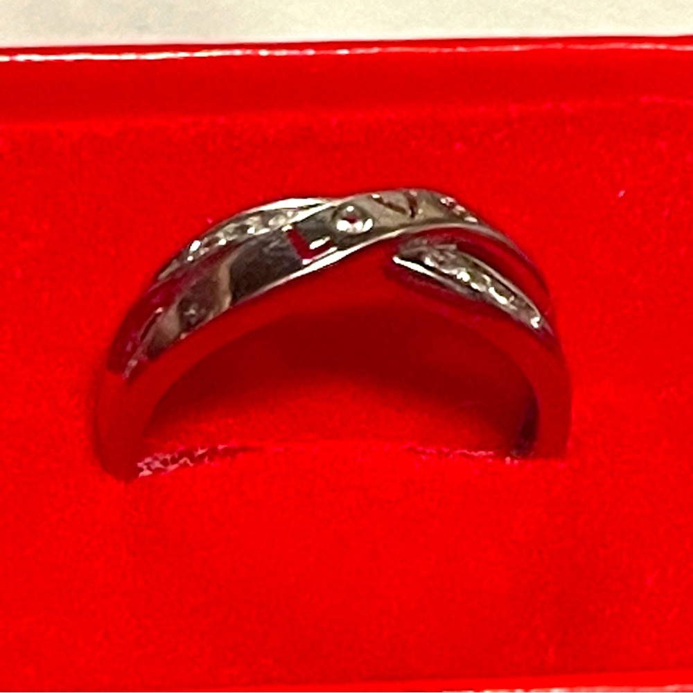 10k white gold diamond band with love written on front size 7